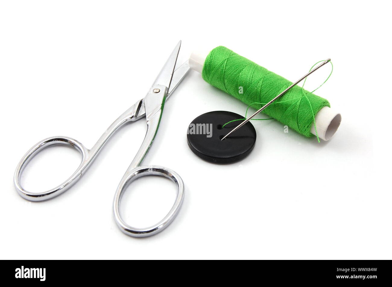 sewing kit isolated on a white background Stock Photo - Alamy