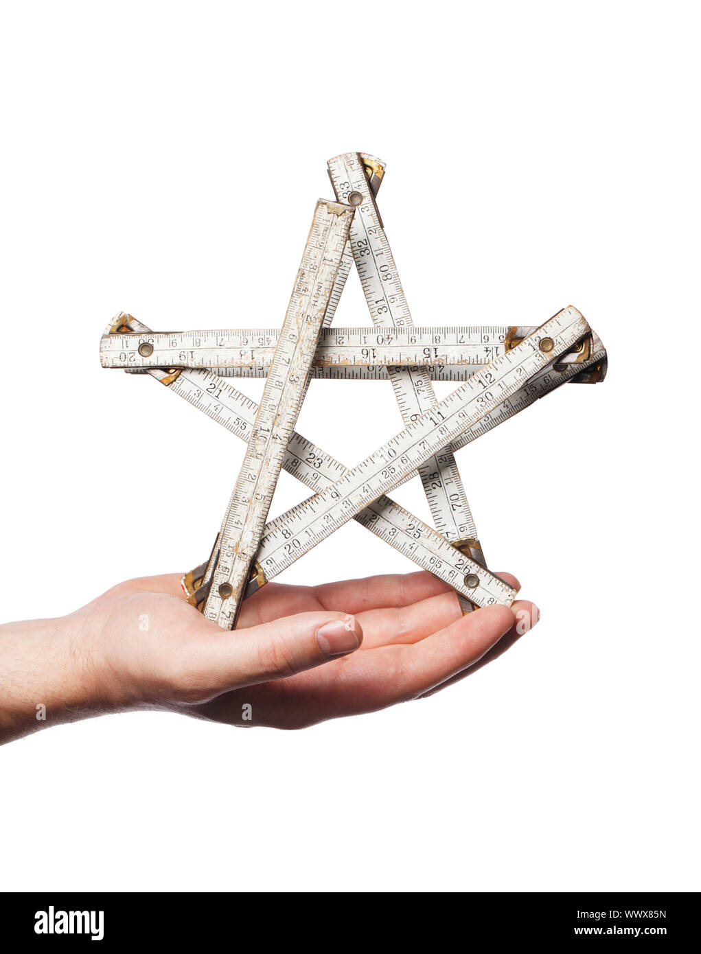 Folding carpenter ruler as a star Stock Photo Alamy