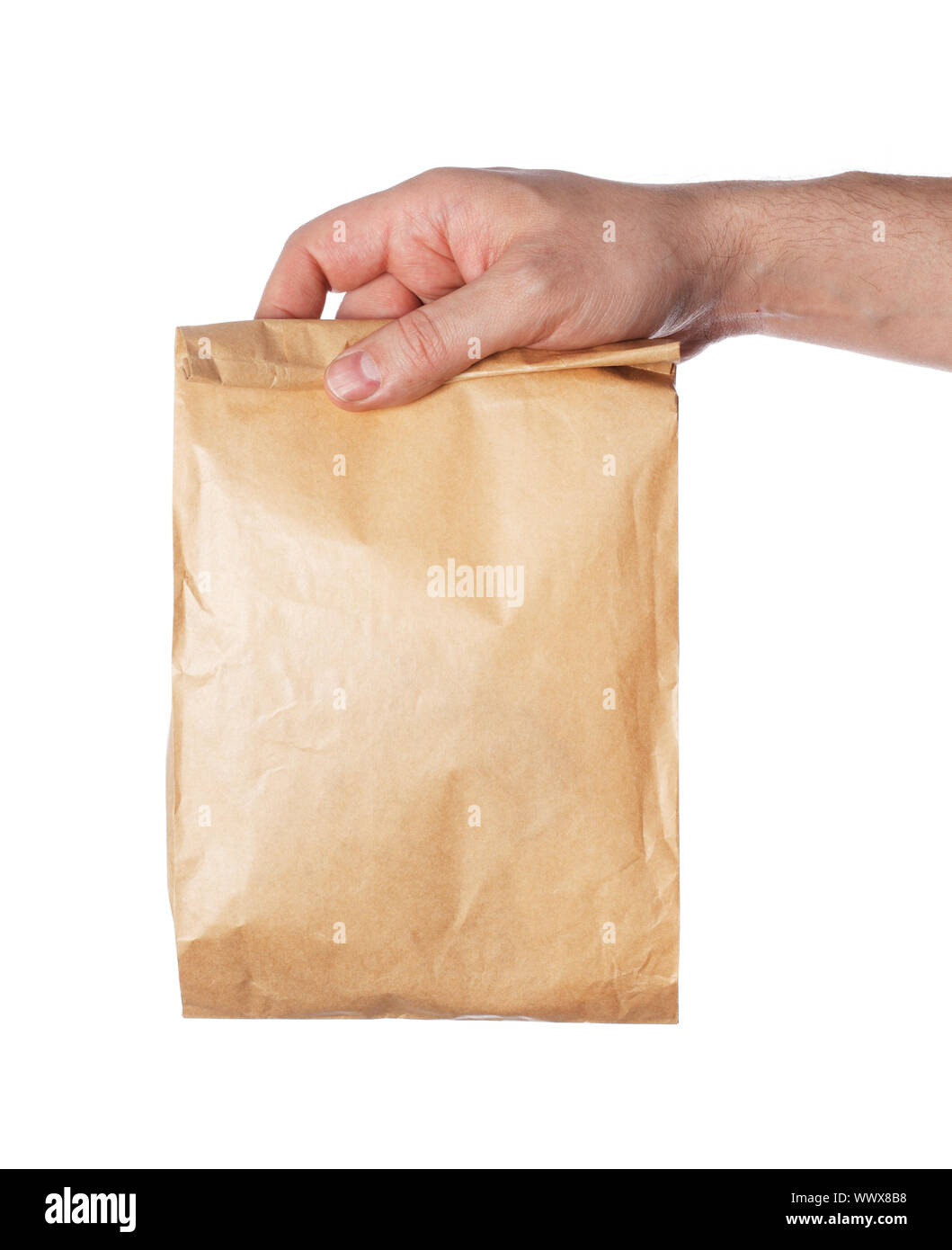 Man holding a brown paper bag in his hand Stock Photo Alamy