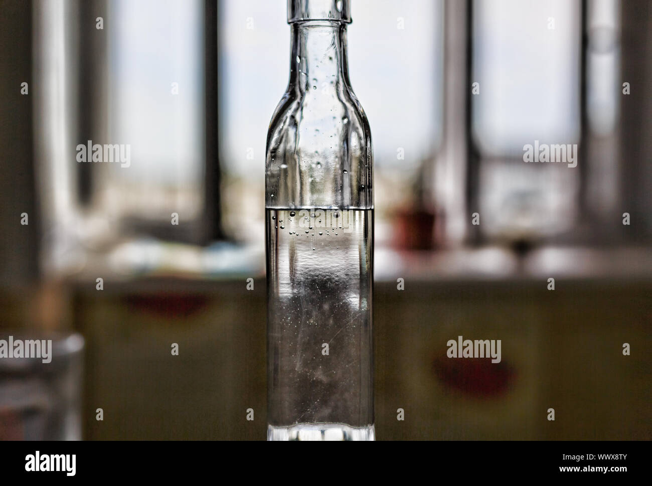 white vinegar on the wooden table top Stock Photo Alamy