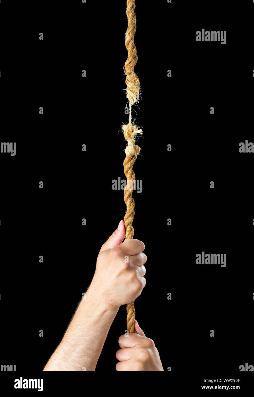 Hands climbing a rope that breaks Stock Photo Alamy
