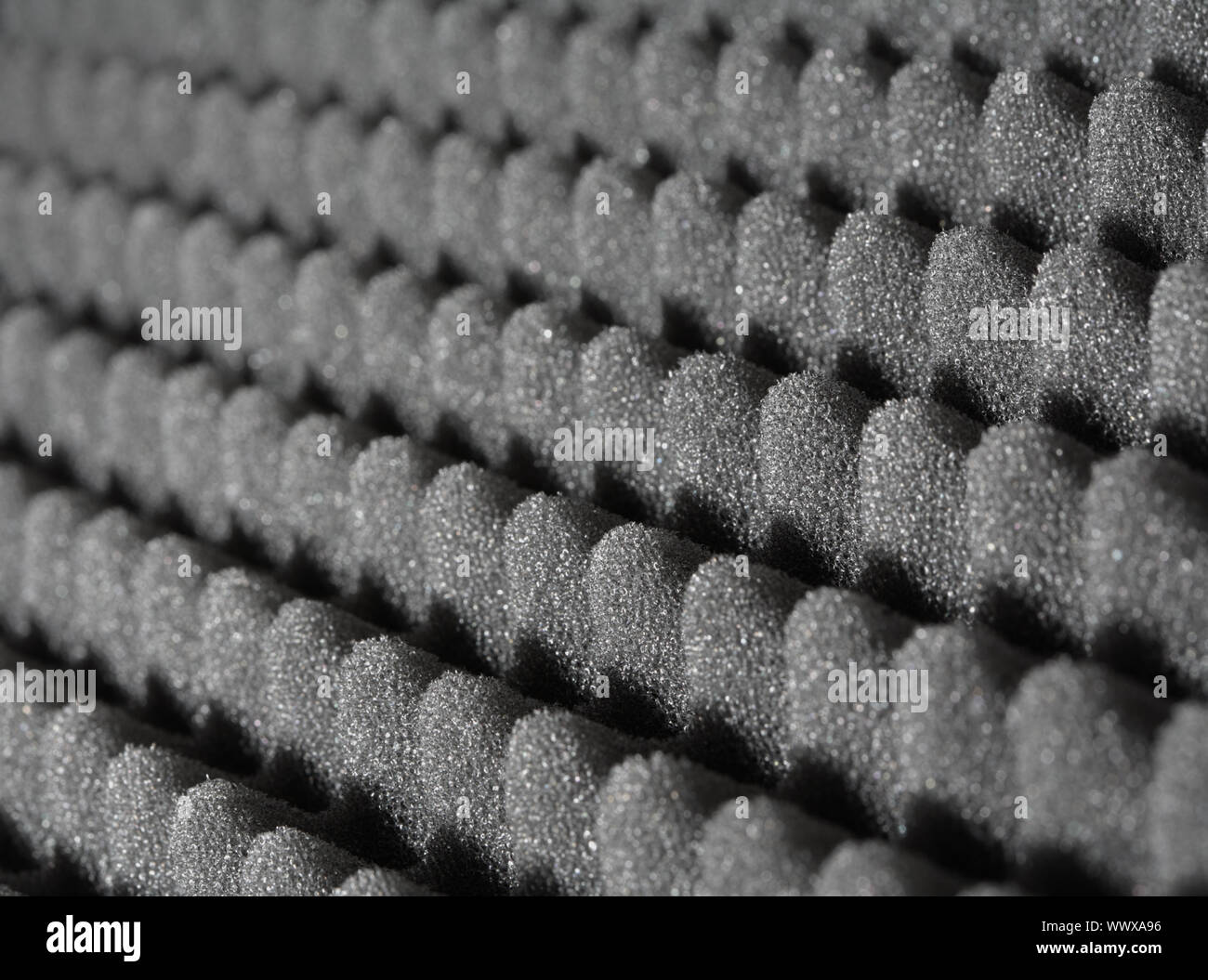 Bumpy open-cell foam rubber. Short depth-of-field Stock Photo - Alamy