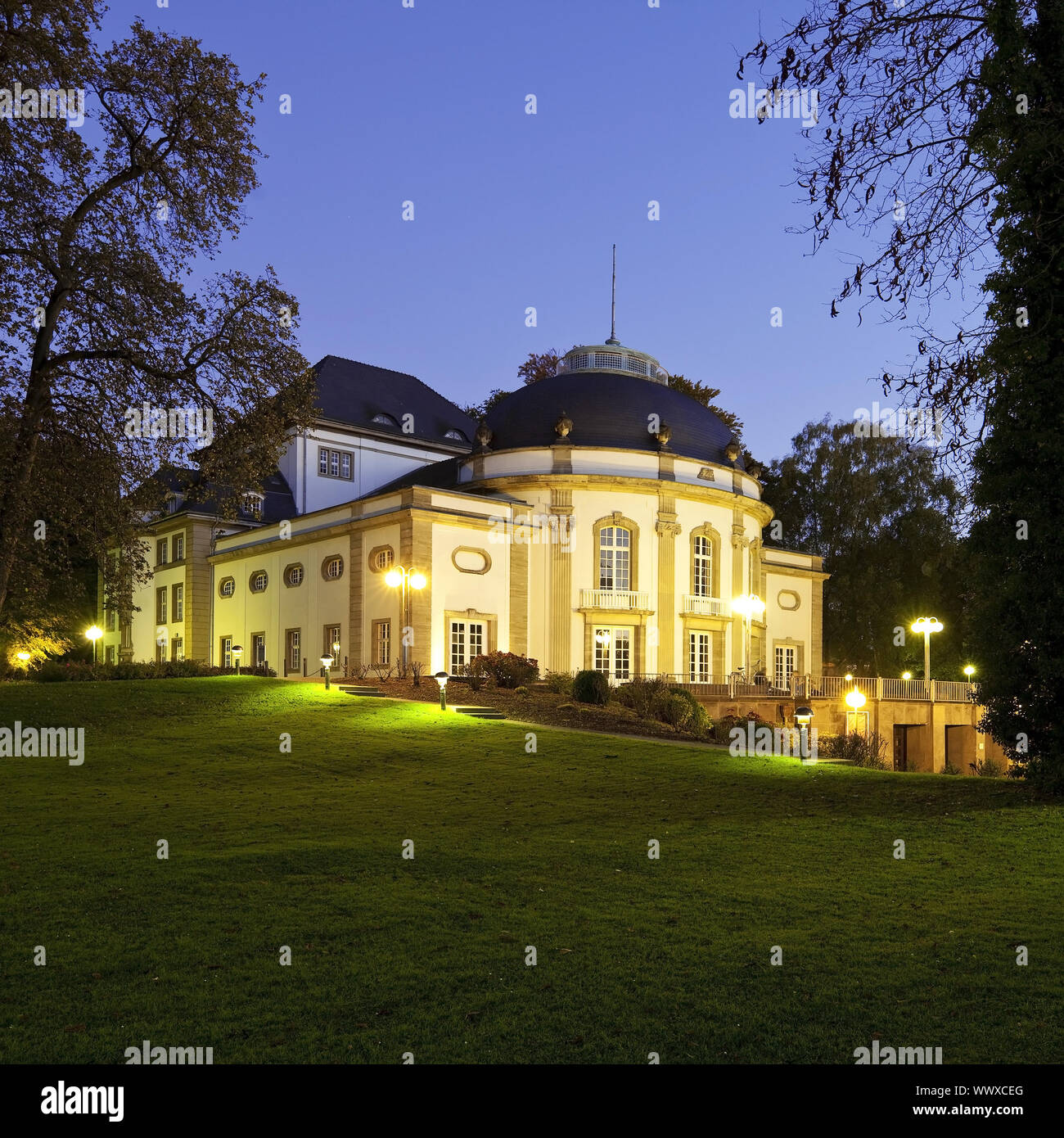 illuminated theatre in the spa park at blue hour, Bad Oeynhausen, East Westphalia, Germany, Europe Stock Photo