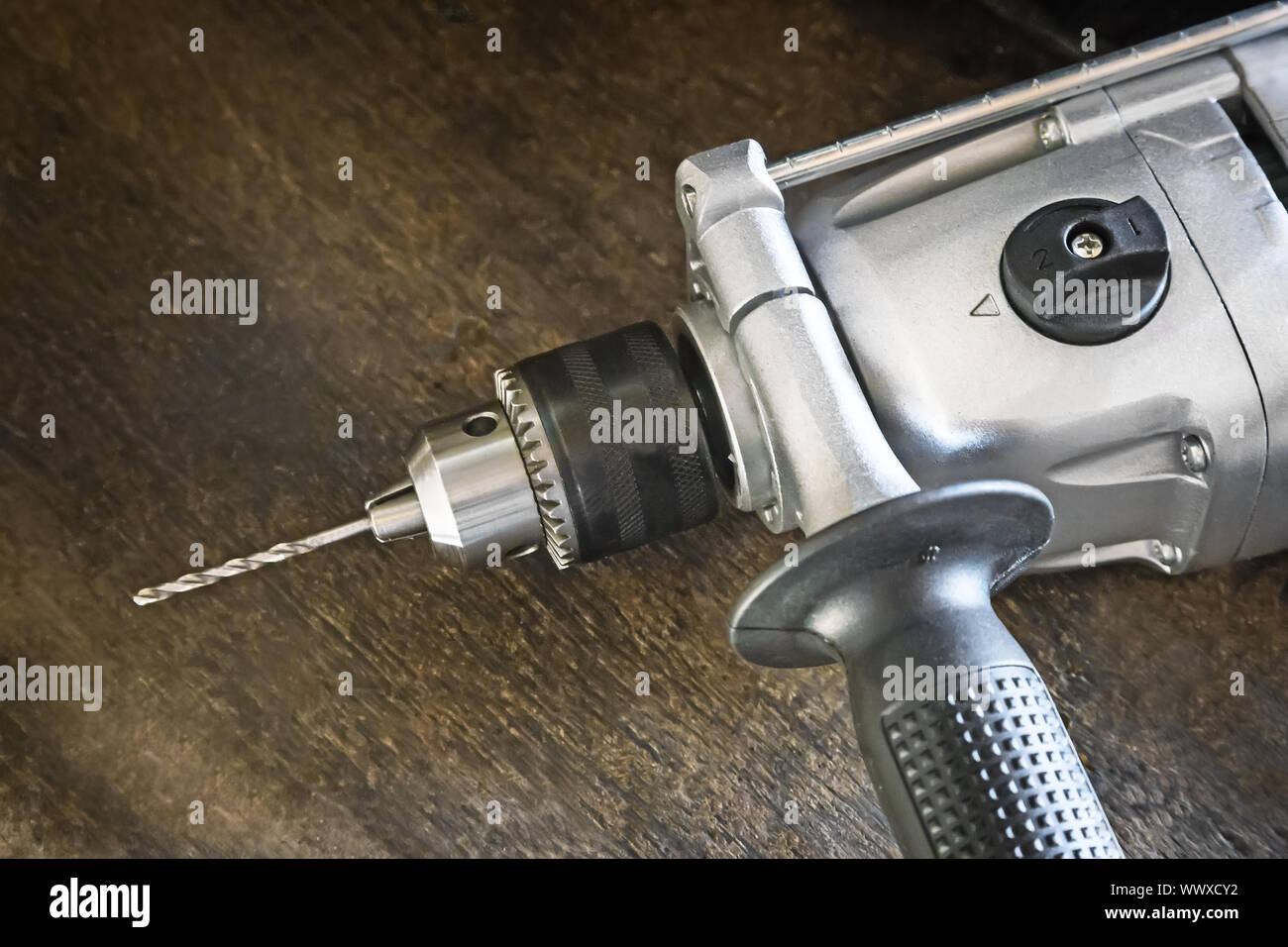 Small electric drill with a drill bit Stock Photo Alamy