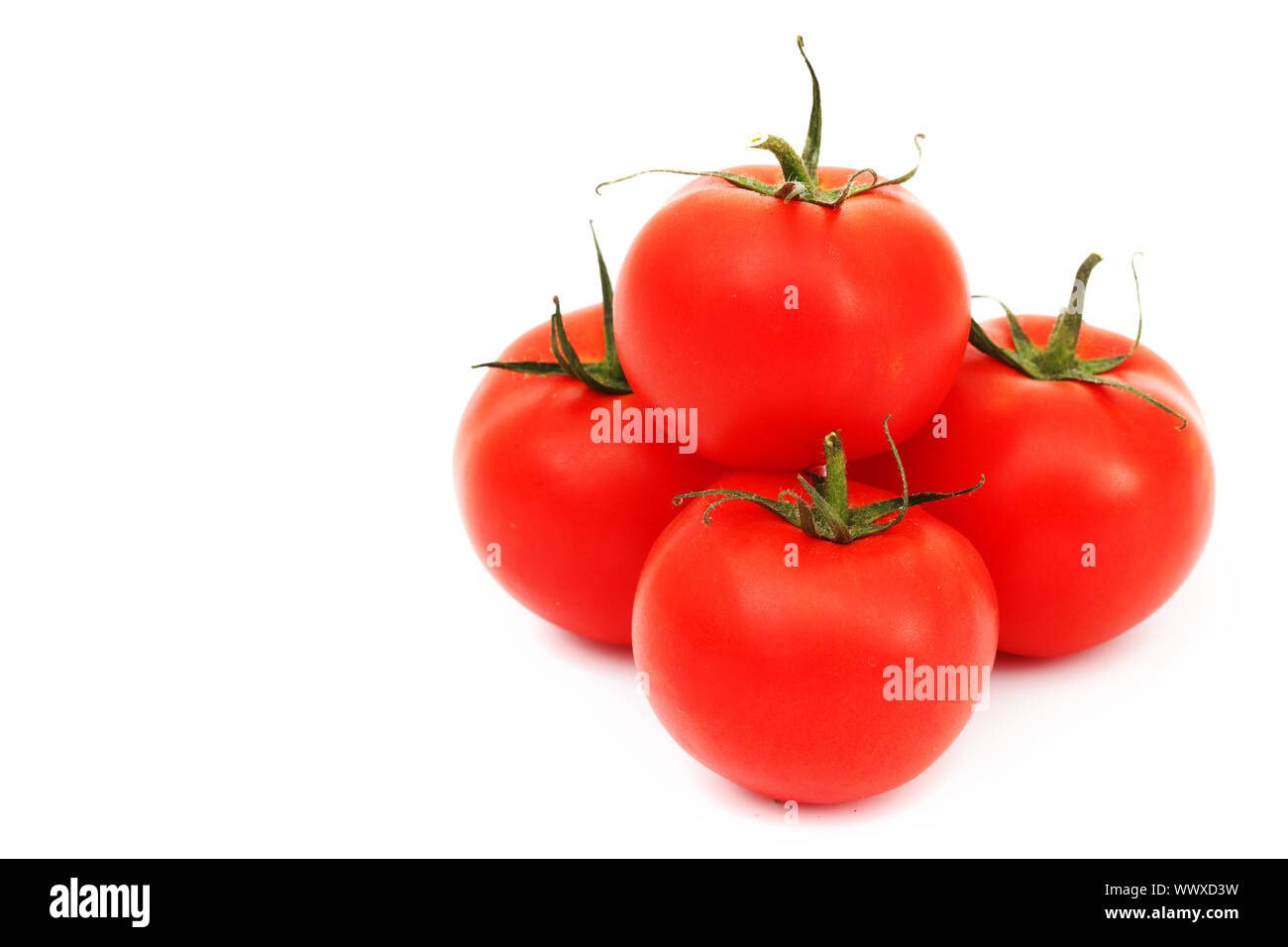 tomato pile isolated on white Stock Photo - Alamy