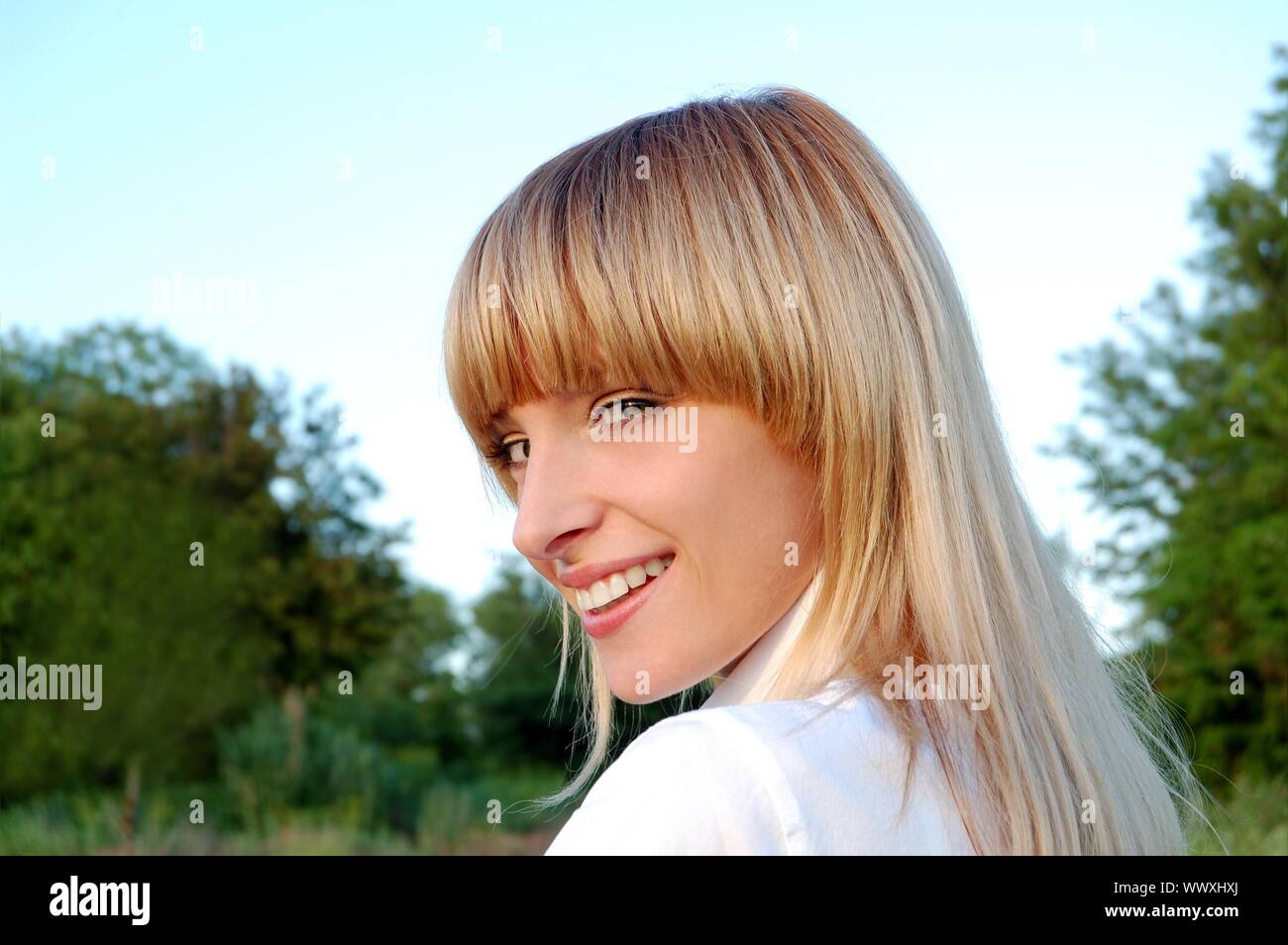 The portrait of beautiful young woman Stock Photo - Alamy