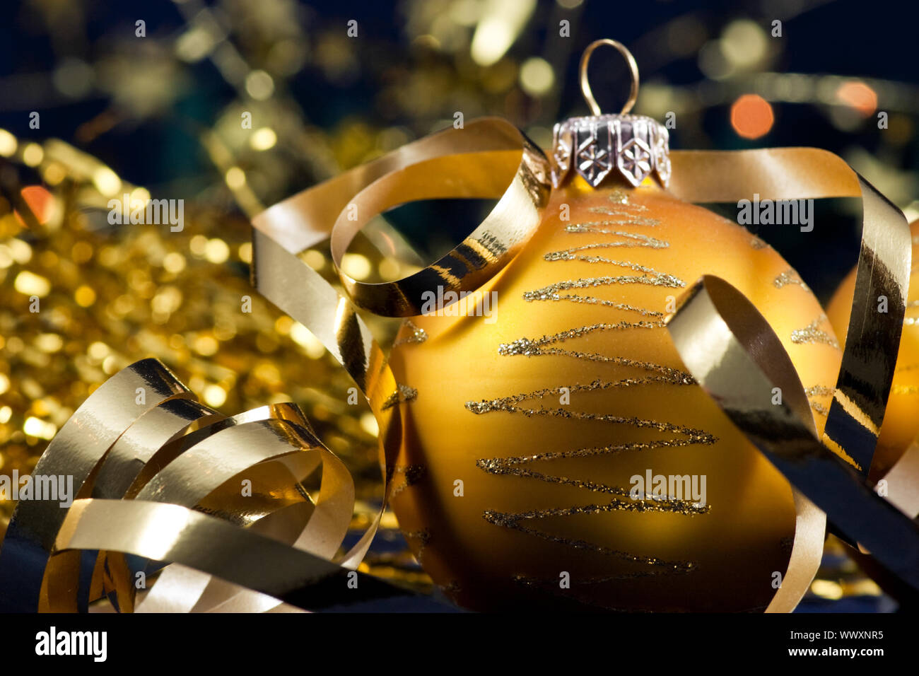 Christmas golden baubles, selective focus Stock Photo
