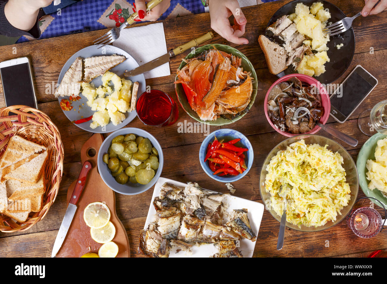 Festive meal. Christmas or Thanksgiving. Happy family at dinner. A Variety  of Home-made Dishes Stock Photo - Alamy