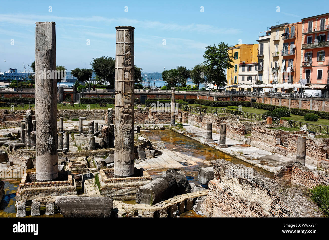 Macellum di Pozzuoli; Tempi di Serepide; market; columns measure height of sea level; 1st century; old ruins; buildings, restaurant, outdoor tables, u Stock Photo