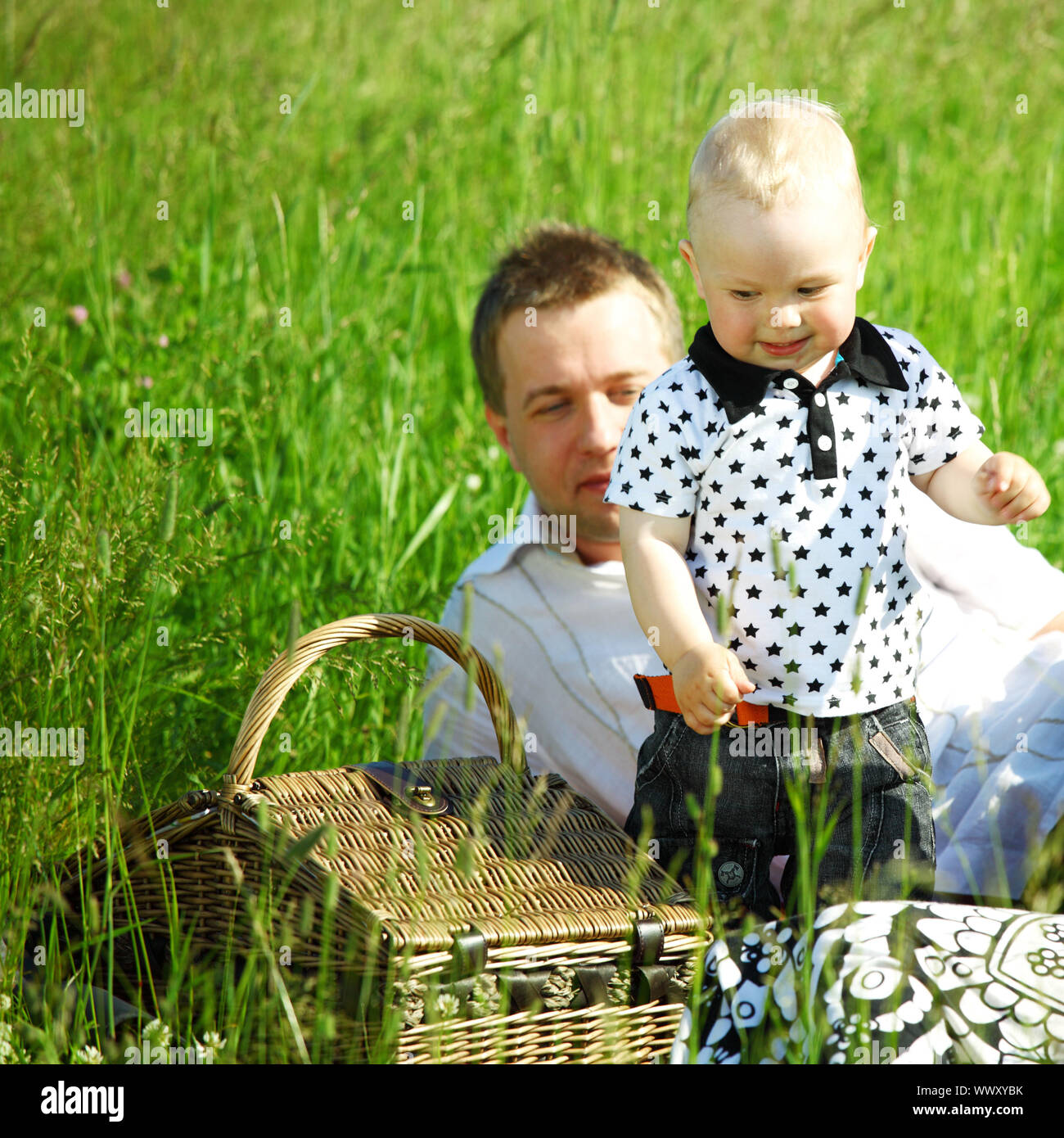 father and son in the grass Stock Photo - Alamy