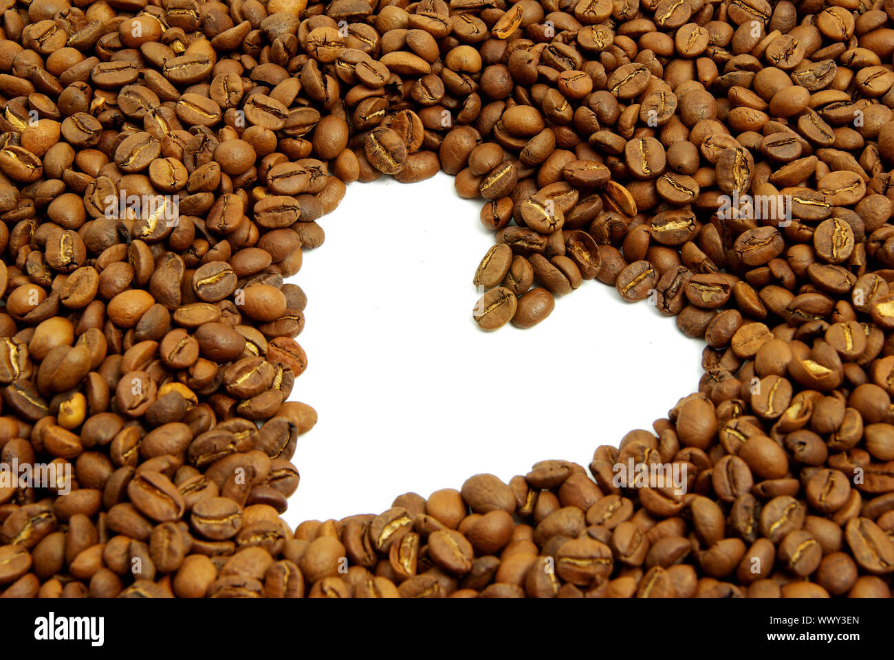 coffee beans isolated on a white background Stock Photo - Alamy