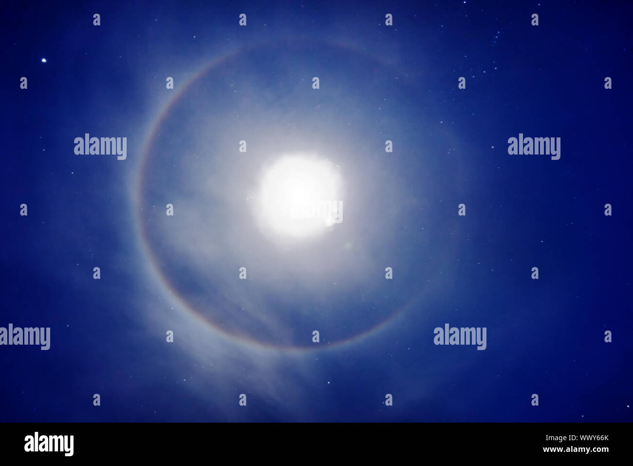 The halo around the moon - night photo Stock Photo