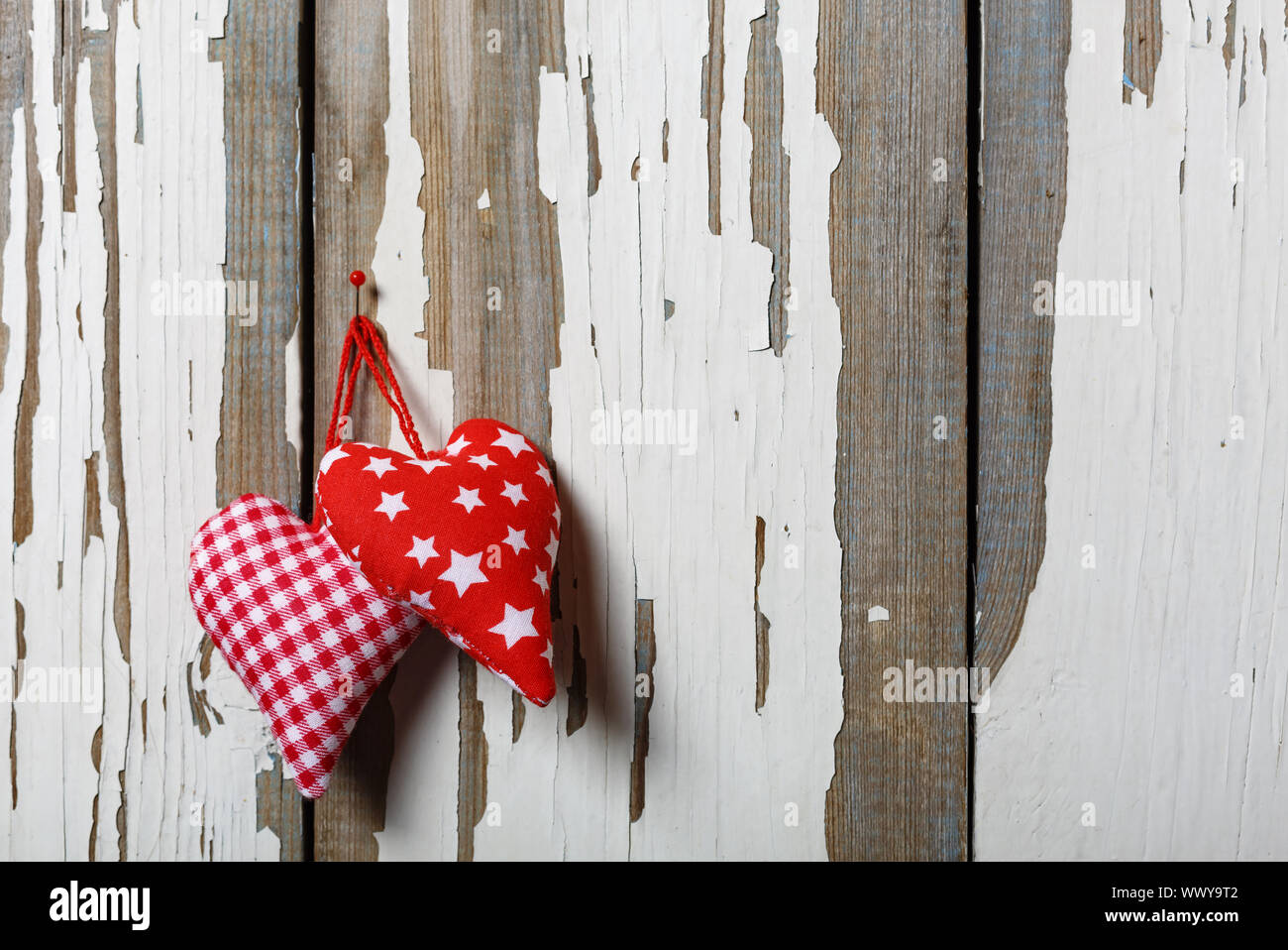 Two homemade hearts on an old wooden background. Concept :: St ...