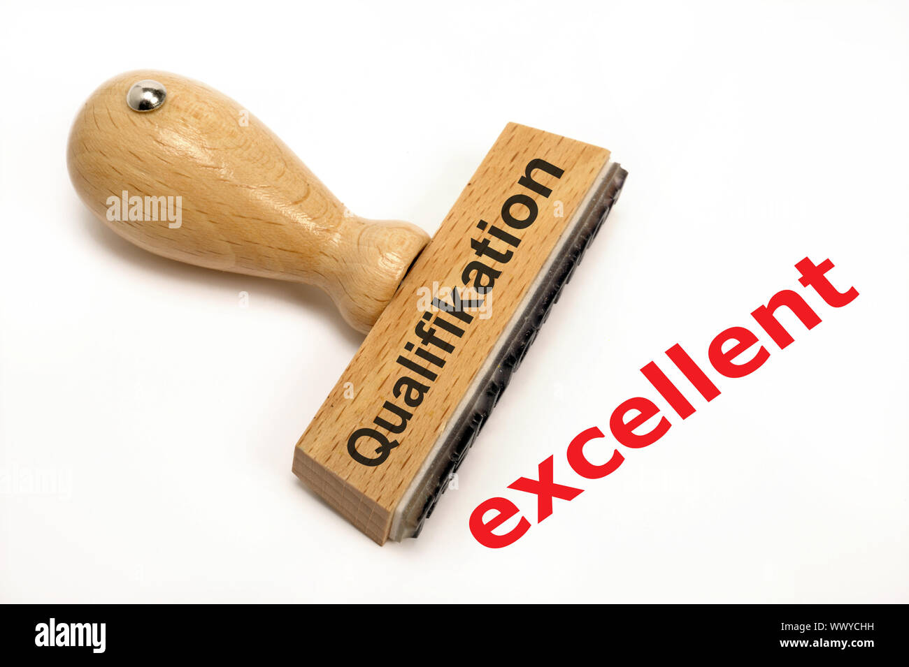 excellent qualification and evaluation marked on wooden stamp Stock Photo