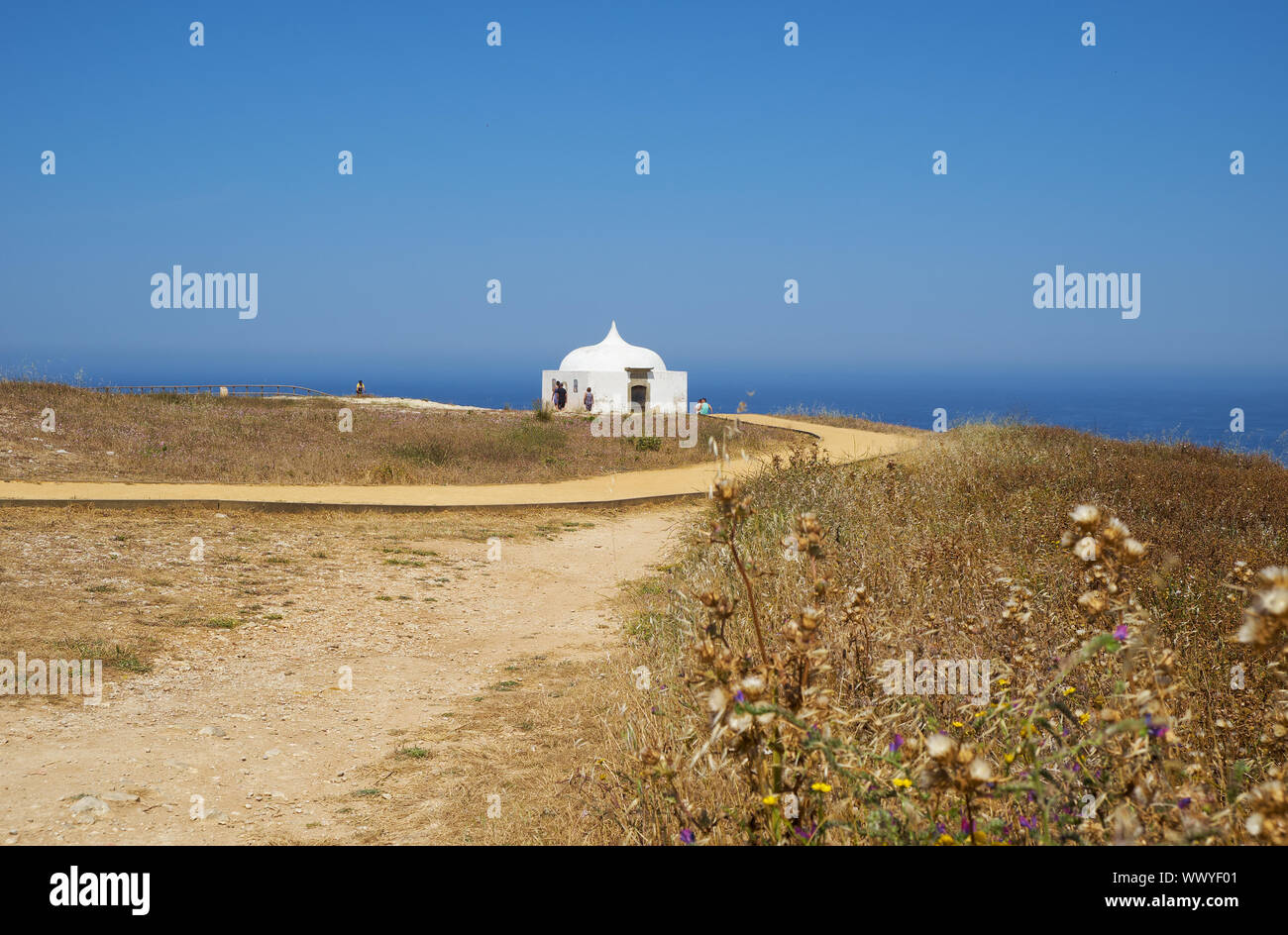 Path near Ermida da Memoria or Memory Chapel of Nossa Senhora do Cabo Church near cape Espichel, Portugal Stock Photo