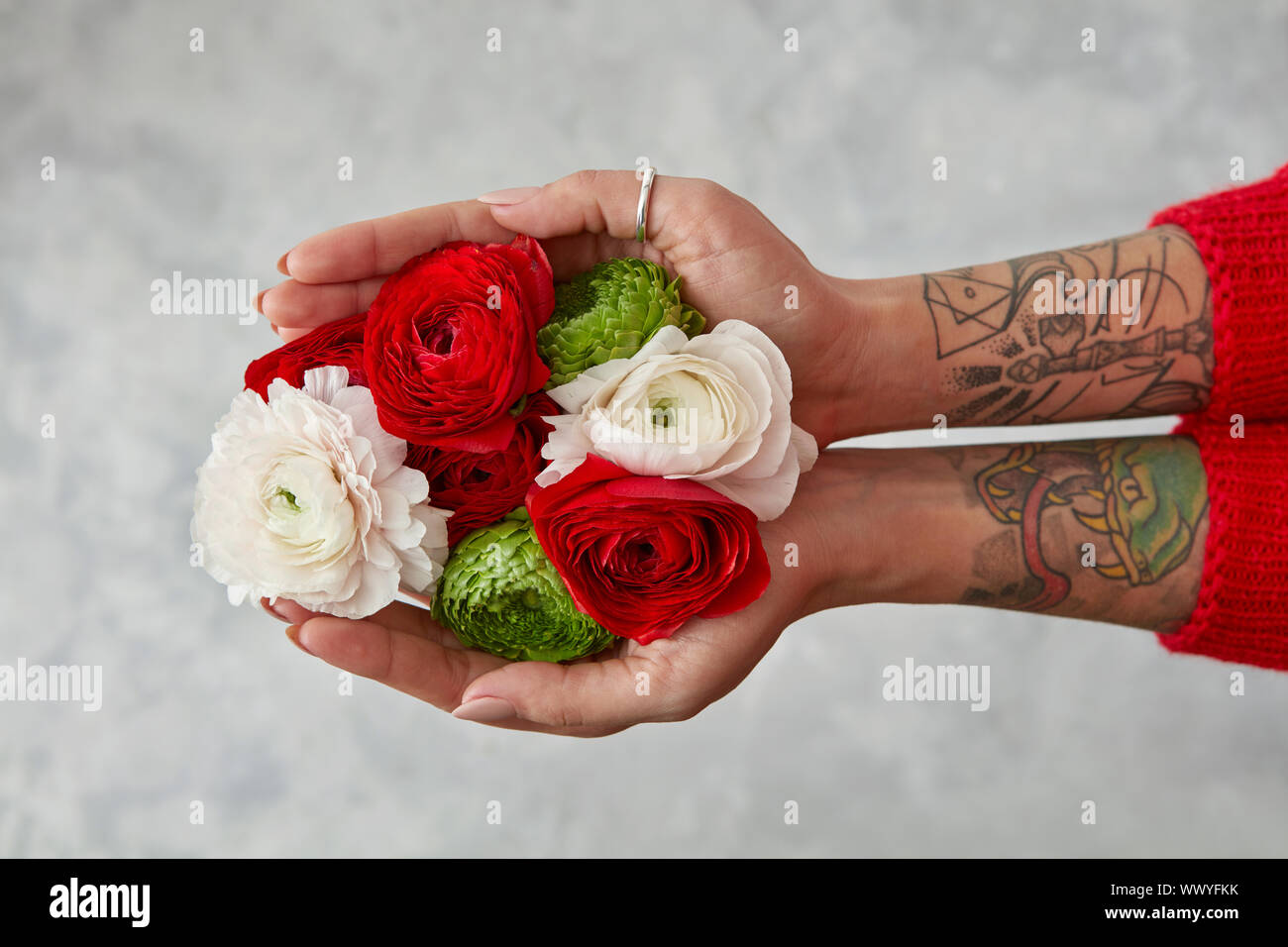 Hand Holding Flowers Temporary Tattoo  Set of 3  Tatteco