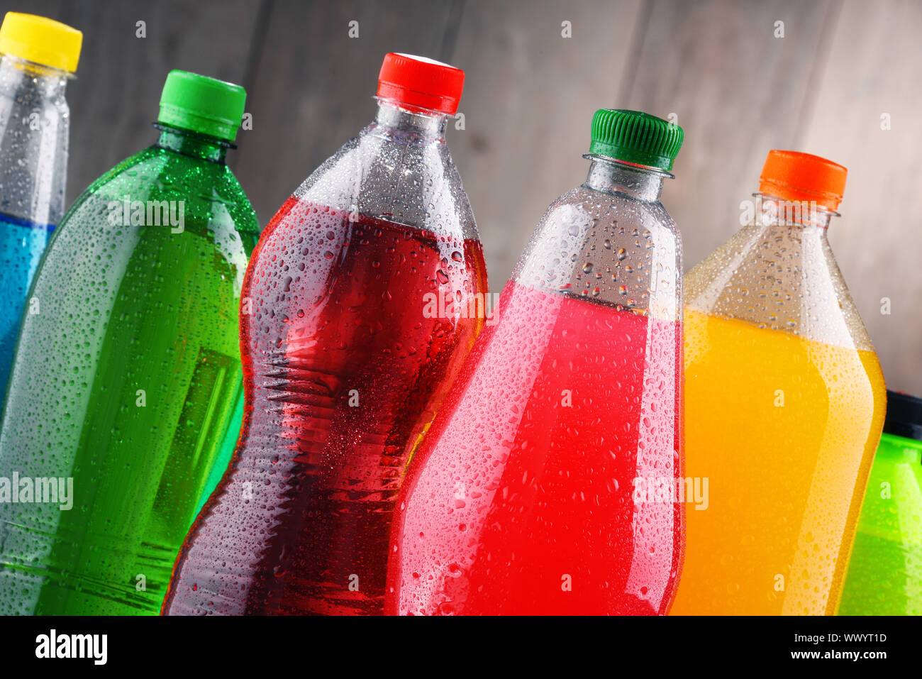Plastic bottles of assorted carbonated soft drinks in variety of colors Stock Photo Alamy