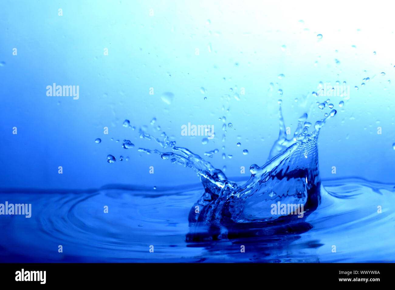 great blue water splash close up macro Stock Photo - Alamy