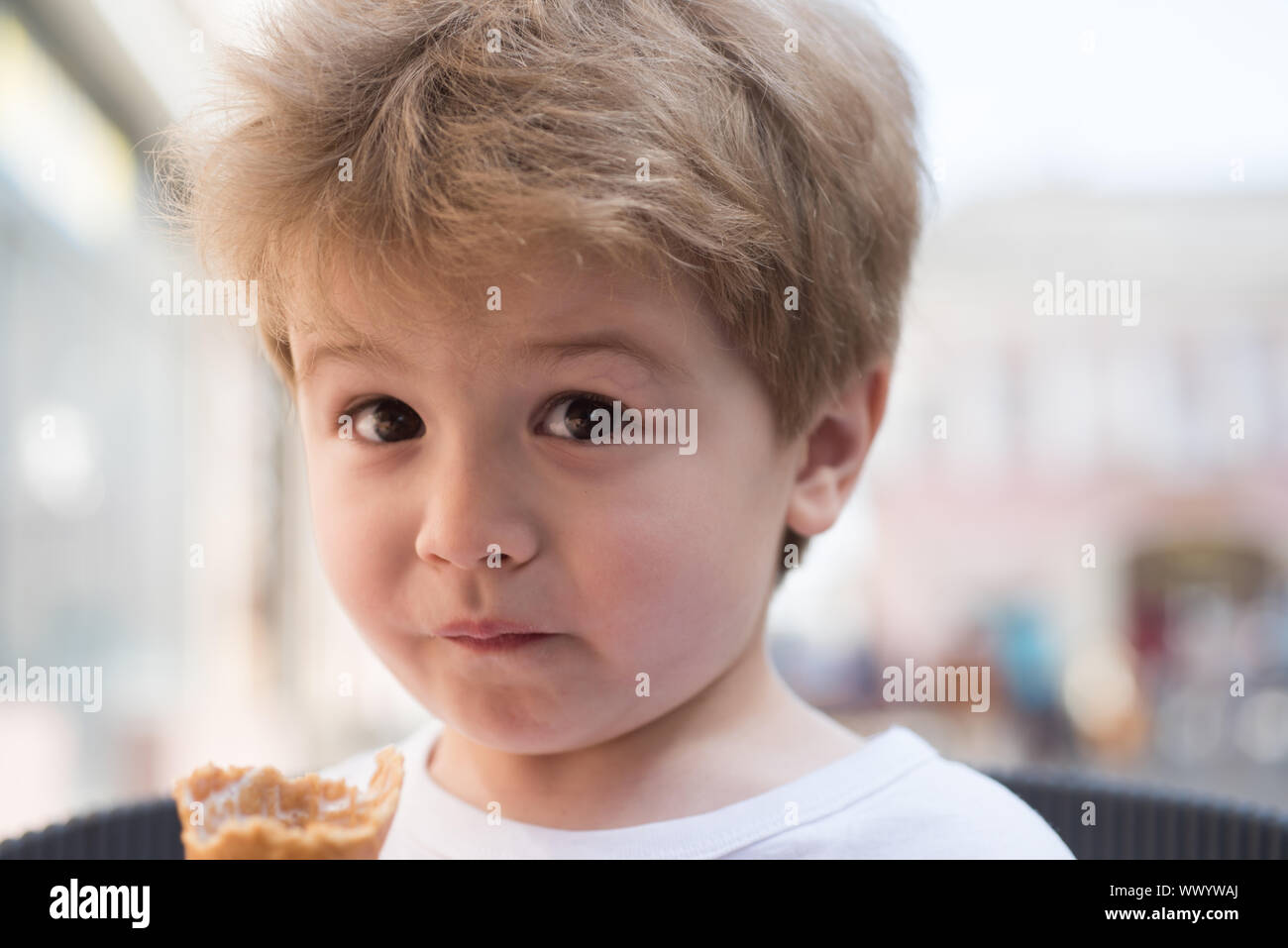 I look nice and so my hair does. Small boy with stylish haircut. Little  child with short blond hair. Little child eating outdoor. Healthy hair care  ha Stock Photo - Alamy