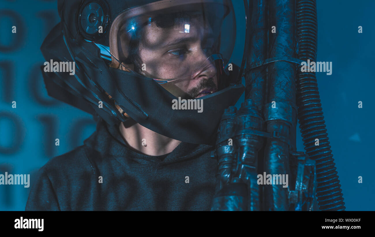Galaxy space man with led lights helmet, space suit and gun in the ...