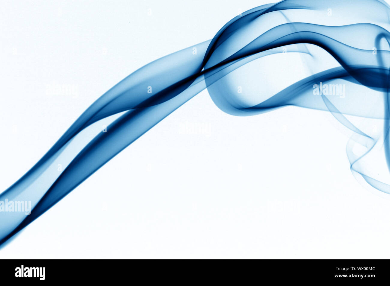 blue smoke on white background Stock Photo - Alamy