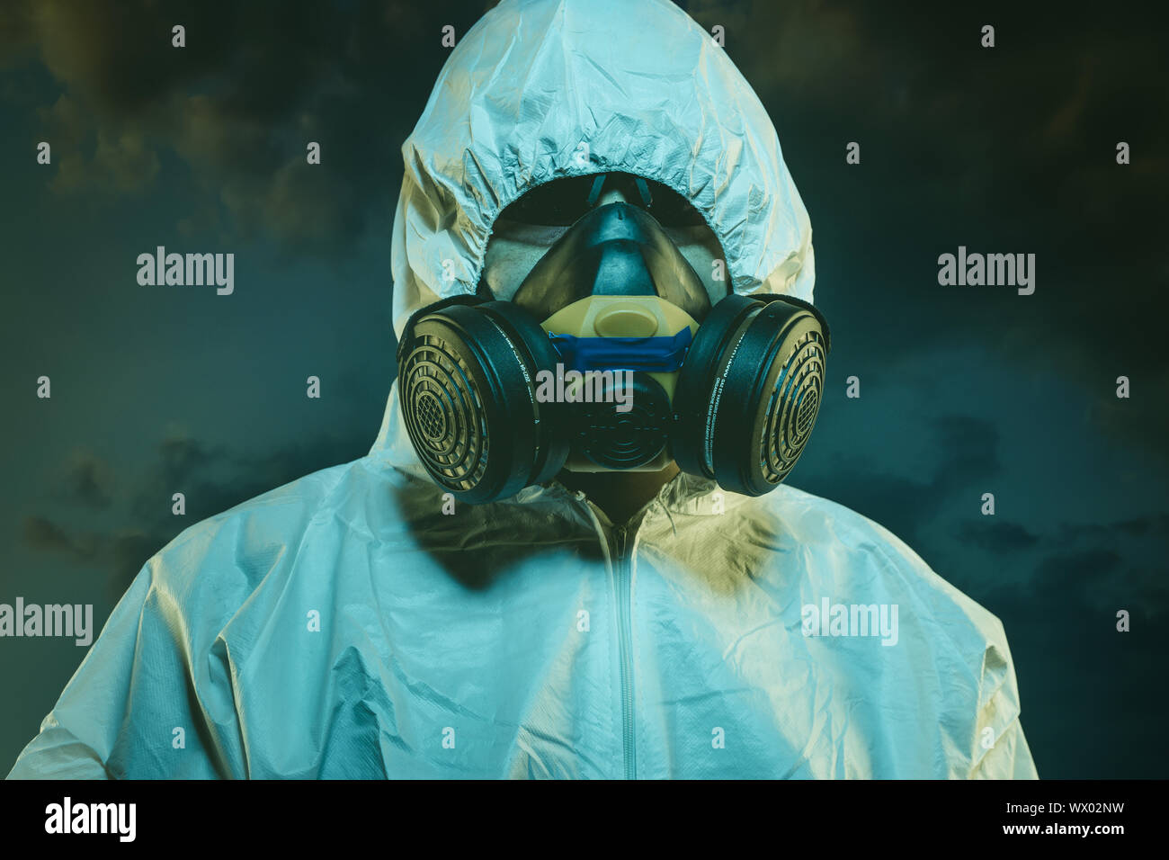 Sick, air contaminated by pollution, man with mask and protective suit ...