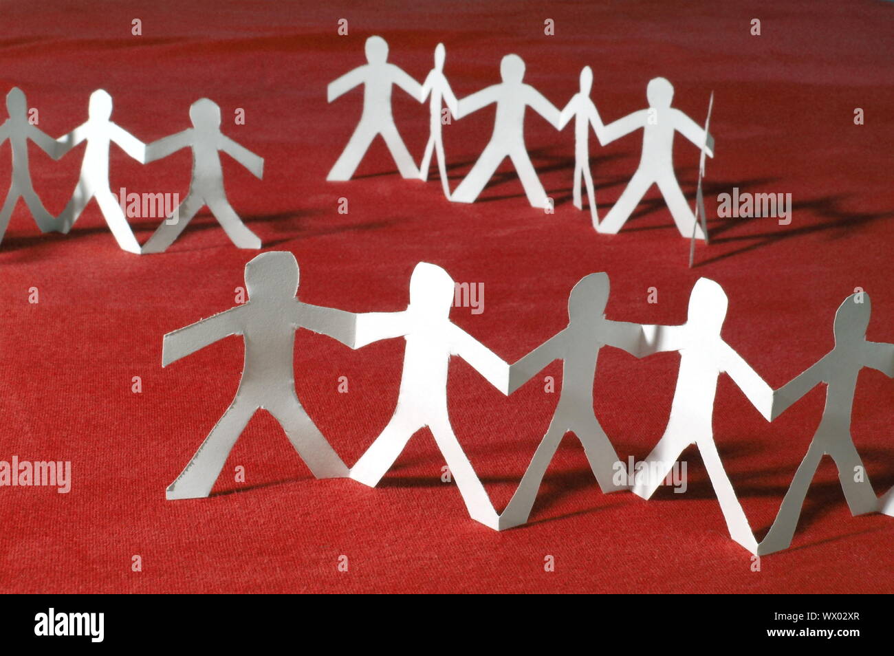team of paper people having a party Stock Photo Alamy