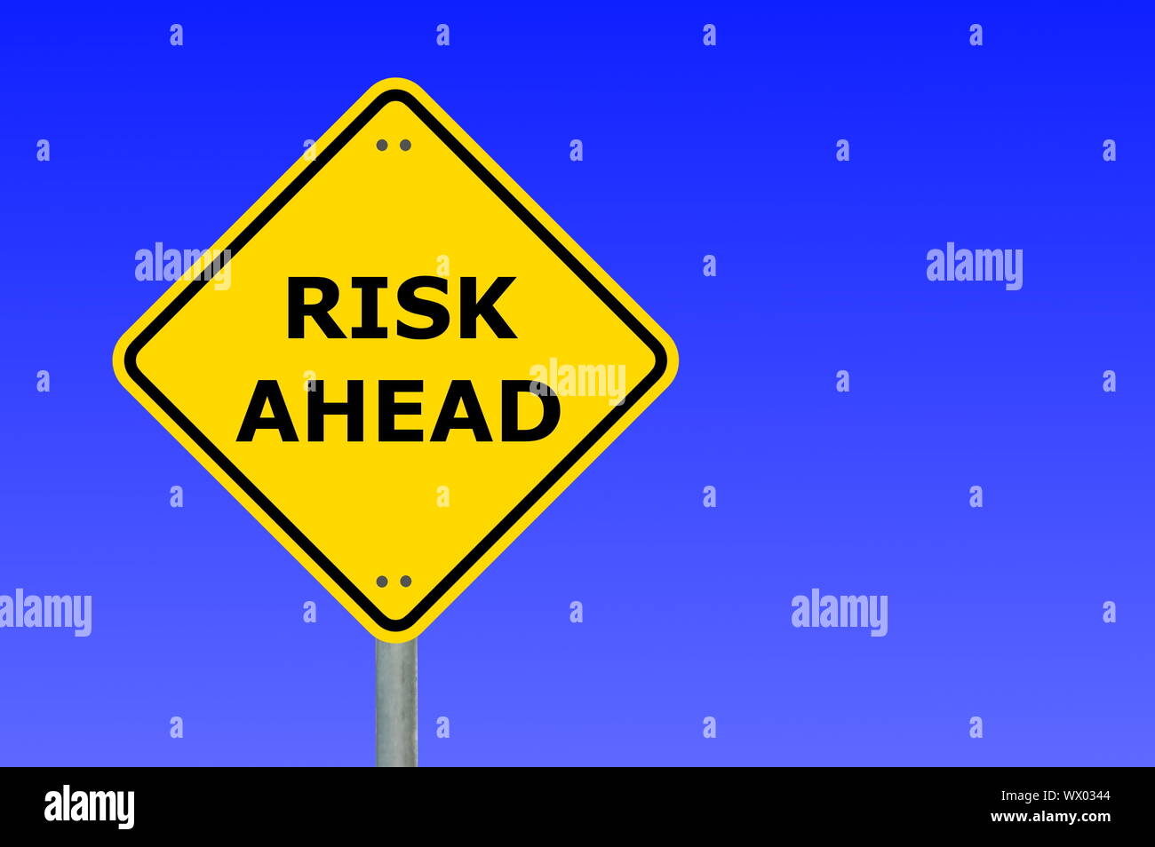 risk management concept with yellow road sign Stock Photo - Alamy