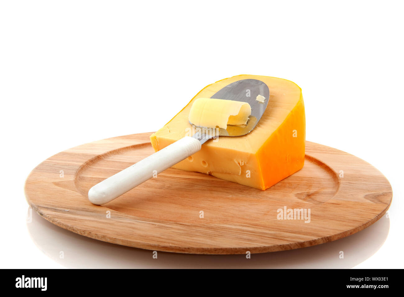 Dutch cheese with typical slicer tool from Holland Stock Photo Alamy