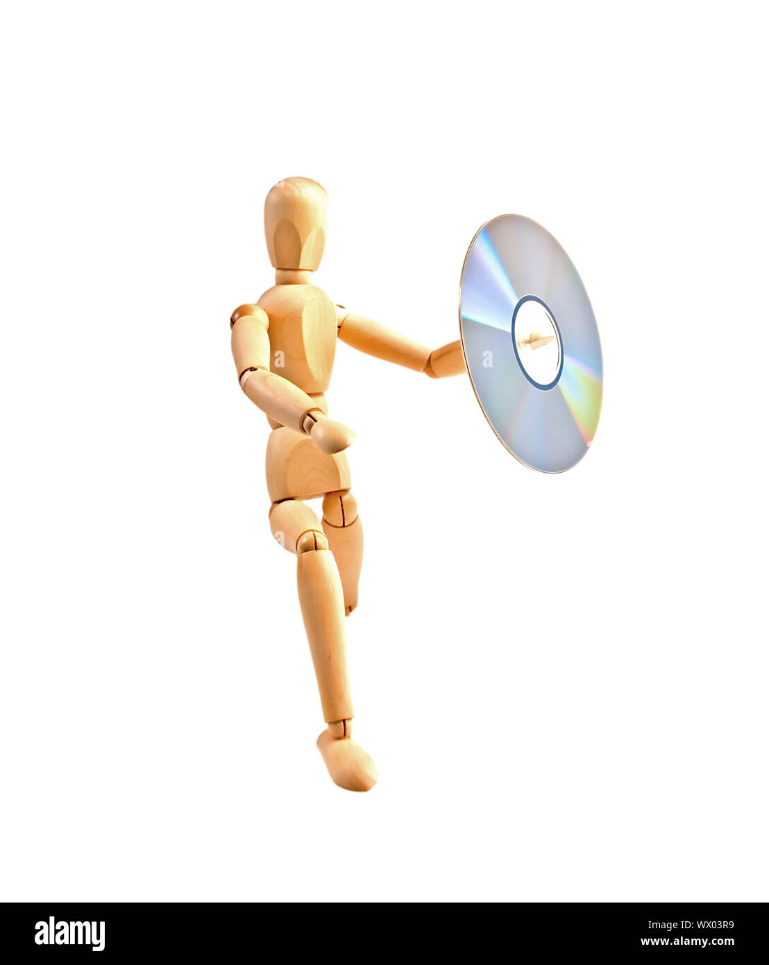 wood mannequin with CD-rom Stock Photo