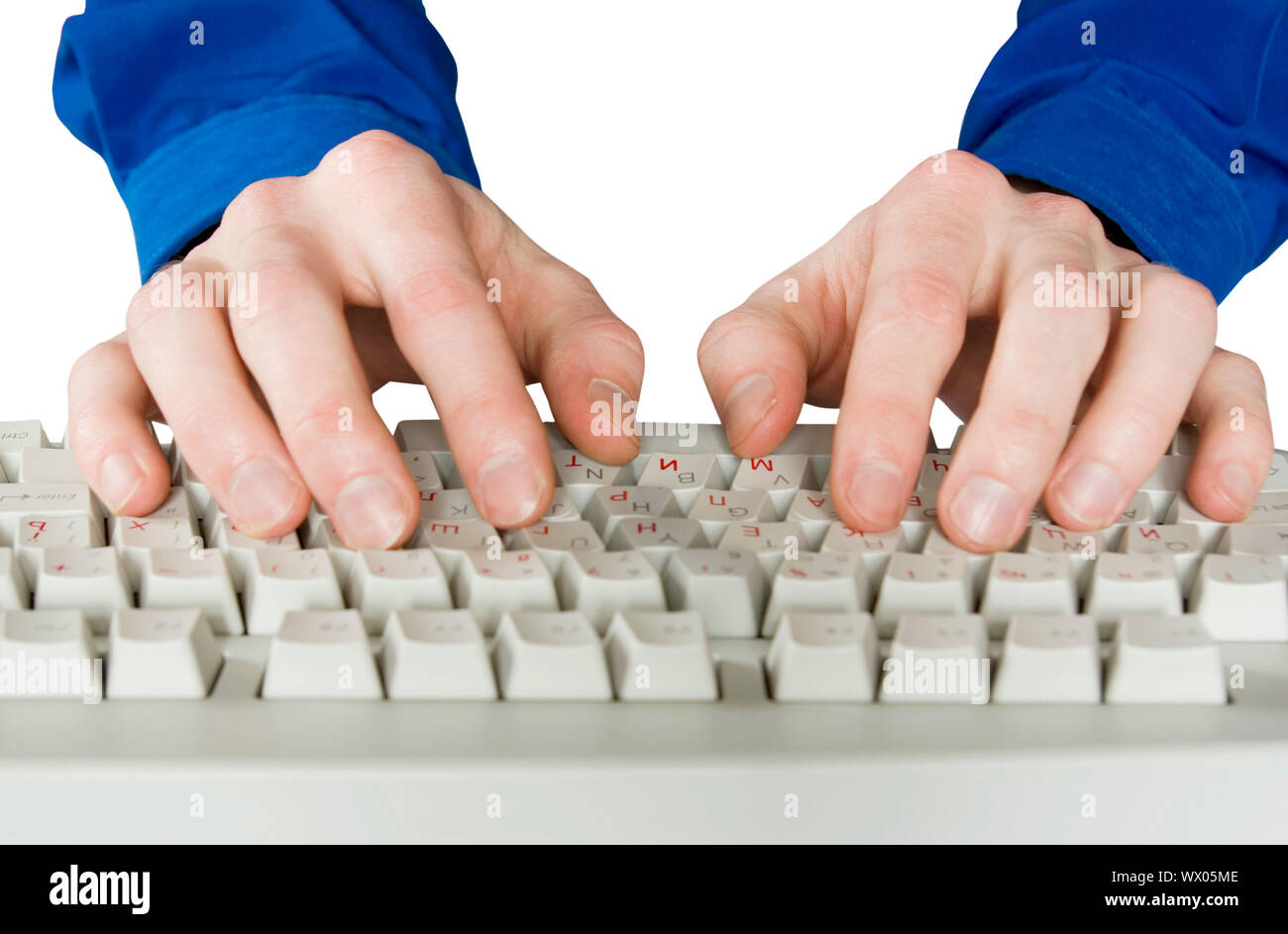 Fingers type a text on the computer keyboard Stock Photo