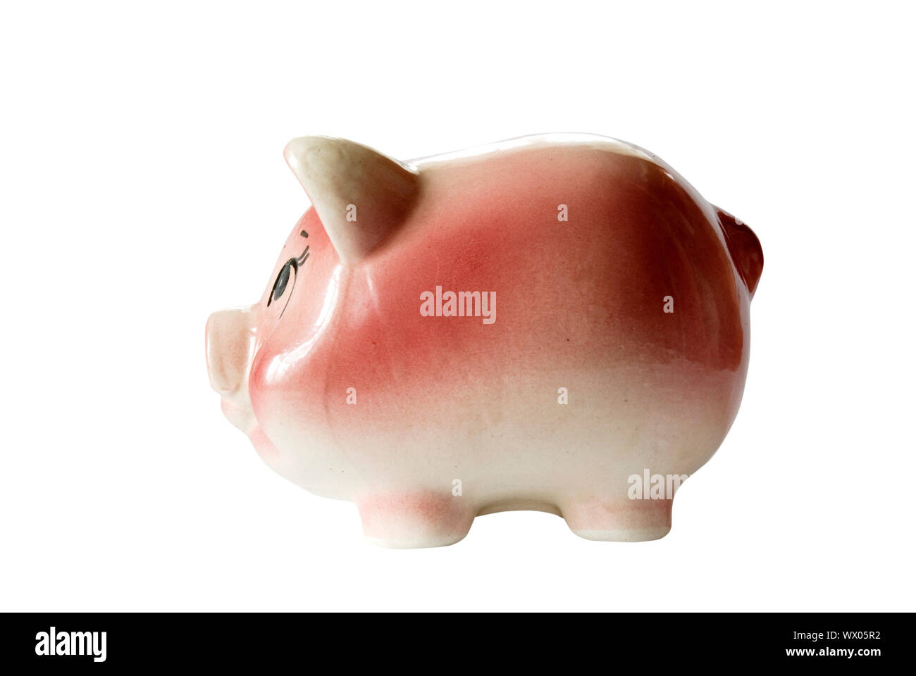 Pink piggy bank isolated on white background with coins Stock Photo - Alamy