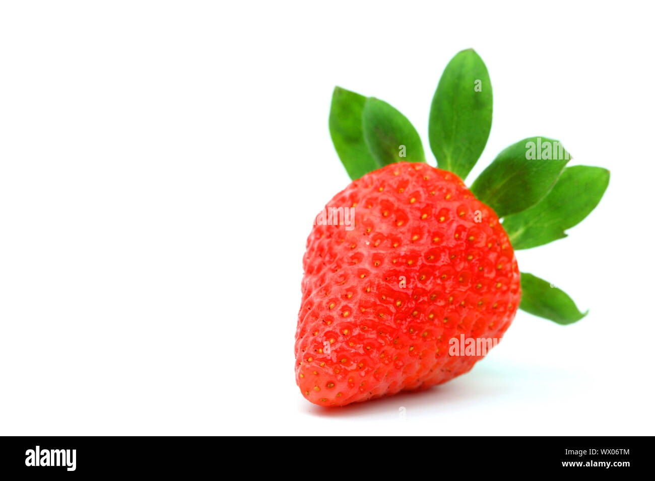 one strawberry isolated on white Stock Photo - Alamy