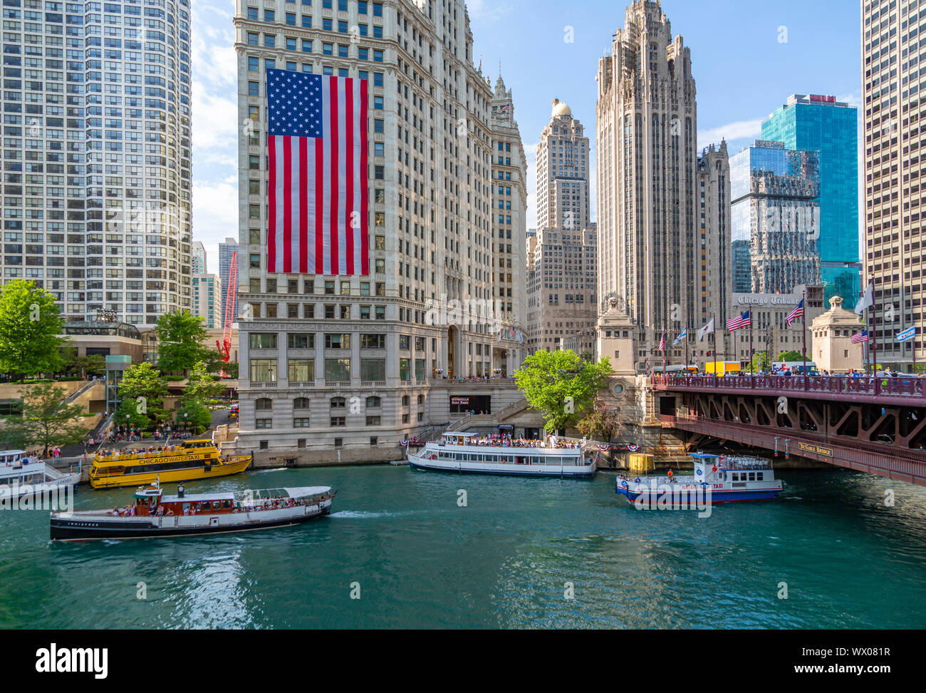 View of American flag on the Wrigley Building and Chicago River, Chicago, Illinois, United States of America, North America Stock Photo