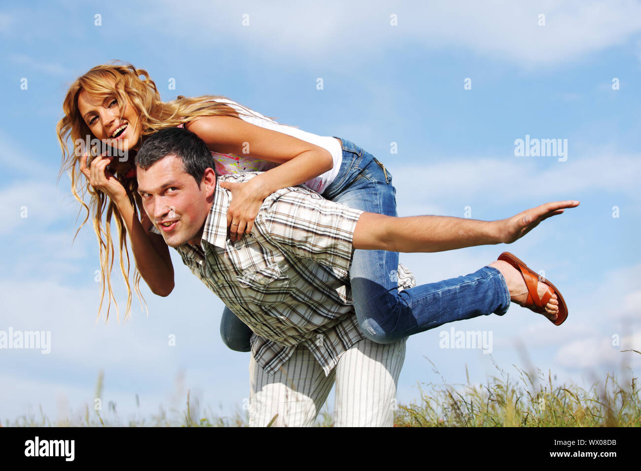 man and woman hug in the sky Stock Photo - Alamy