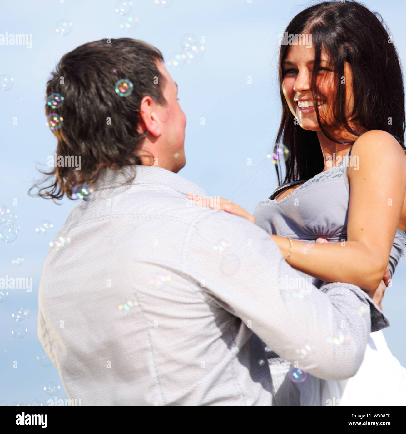man and woman hug in the sky Stock Photo - Alamy