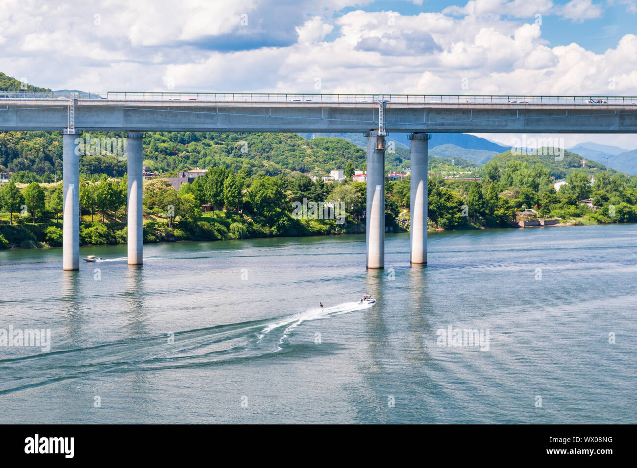 Aerial view photo of high speed water ski towed by speed boat in river, Korea Stock Photo