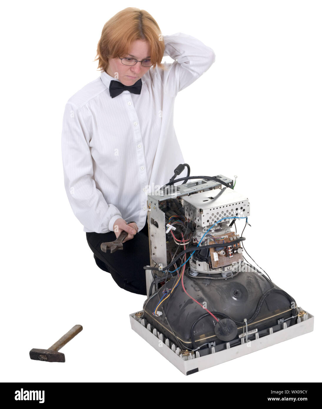 The girl repairing the old electronic equipment Stock Photo Alamy