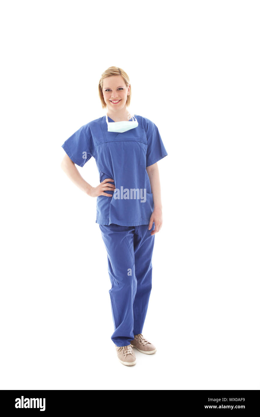 Full length portrait of a friendly young theatre nurse in blue scrubs