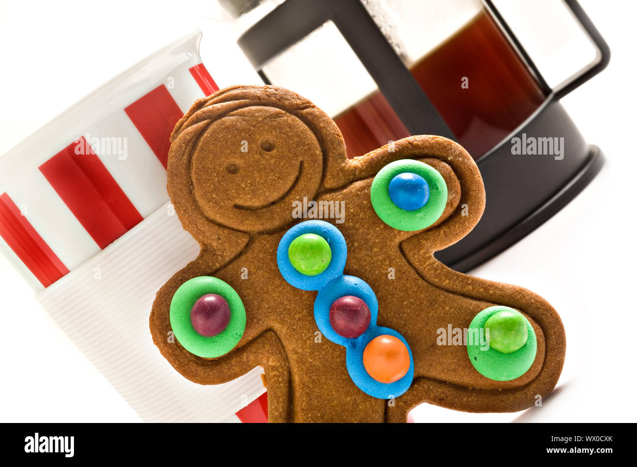 Colorful gingerbread man and coffee on white Stock Photo Alamy
