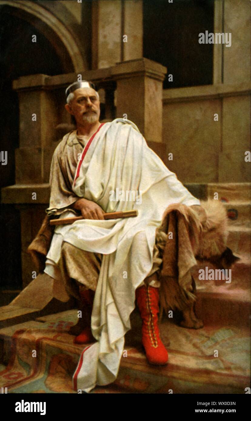 Pilate, 1922. Hans Mayr as Roman governor Pontius Pilate: player in the Oberammergau Passion Play. The play is performed every 10 years, on open-air stages, by the inhabitants of the village of Oberammergau in Bavaria, Germany. First staged in 1634, the play tells the story of Jesus' passion, culminating in his crucifixion. The event has become a tourist attraction, with audiences coming from all over the world. Official postcard of the 1922 Oberammergau Passion Play. [F. Bruckmann, Munich, Germany, 1922] Stock Photo
