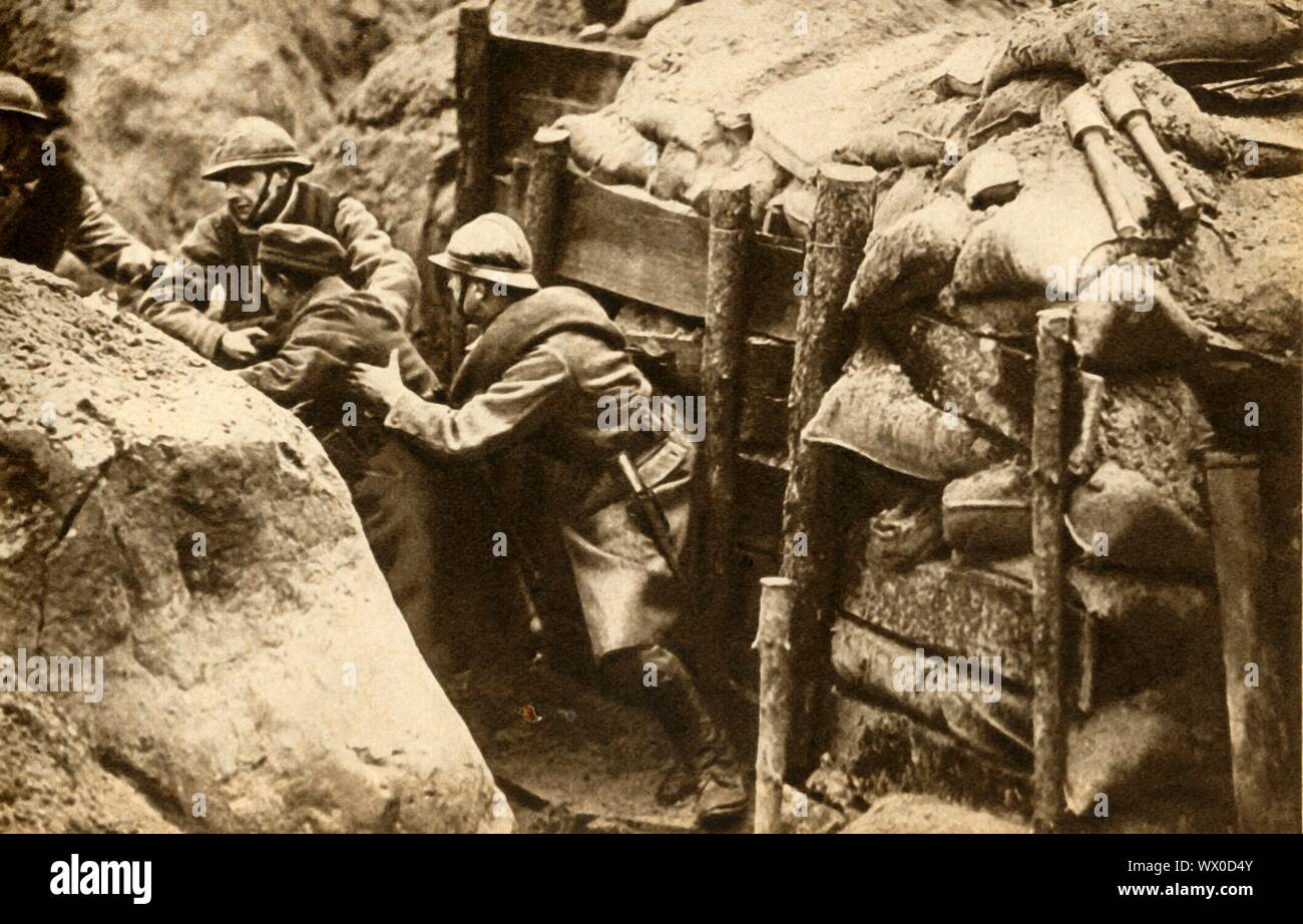 French soldiers raiding a German trench, First World War, 1914-1918, (1933). 'French troops making a daylight raid on the German trenches in search of prisoners for information purposes'. From &quot;The Pageant of the Century&quot;. [Odhams Press Ltd, 1933] Stock Photo