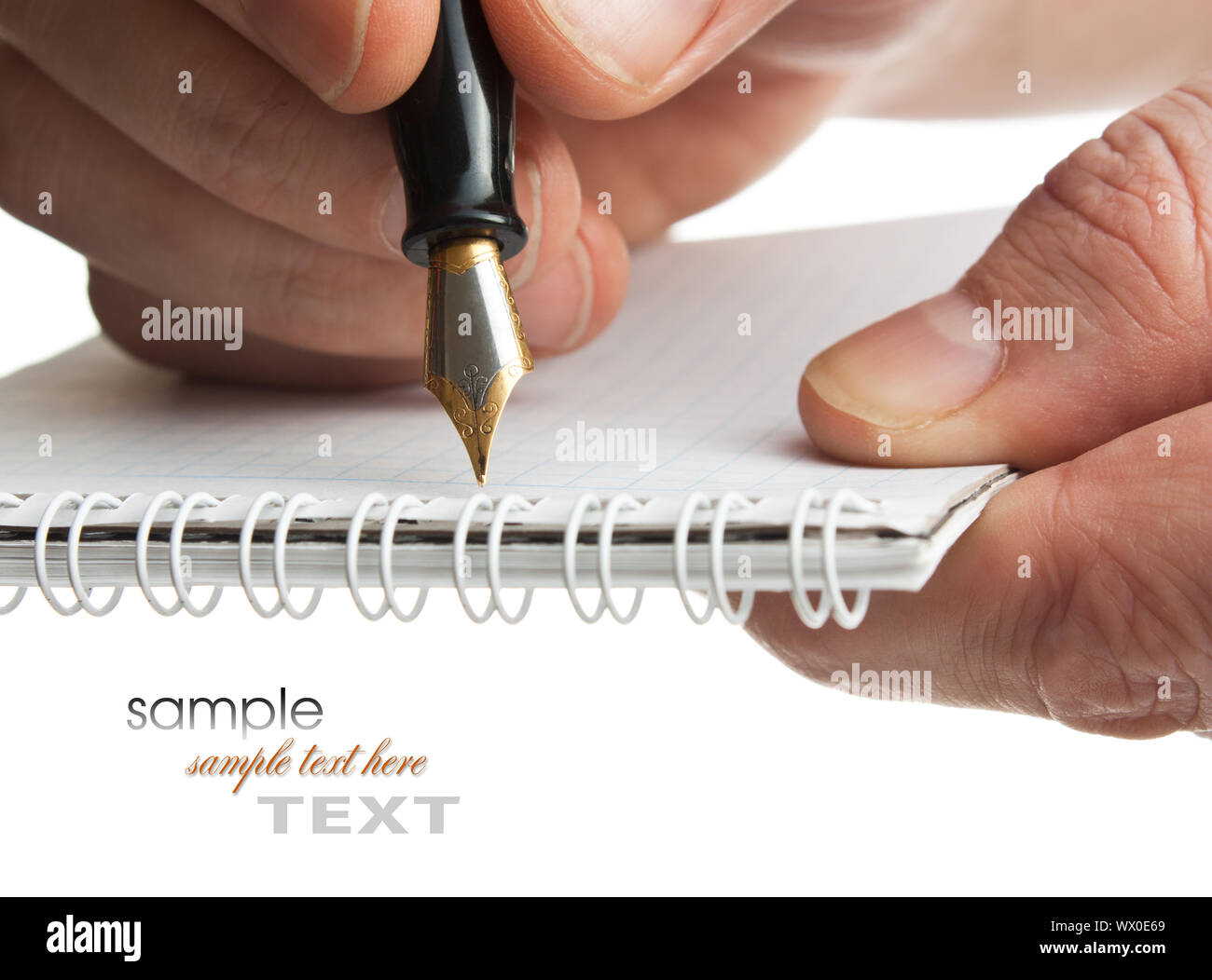 pen in hand isolated on white background Stock Photo - Alamy