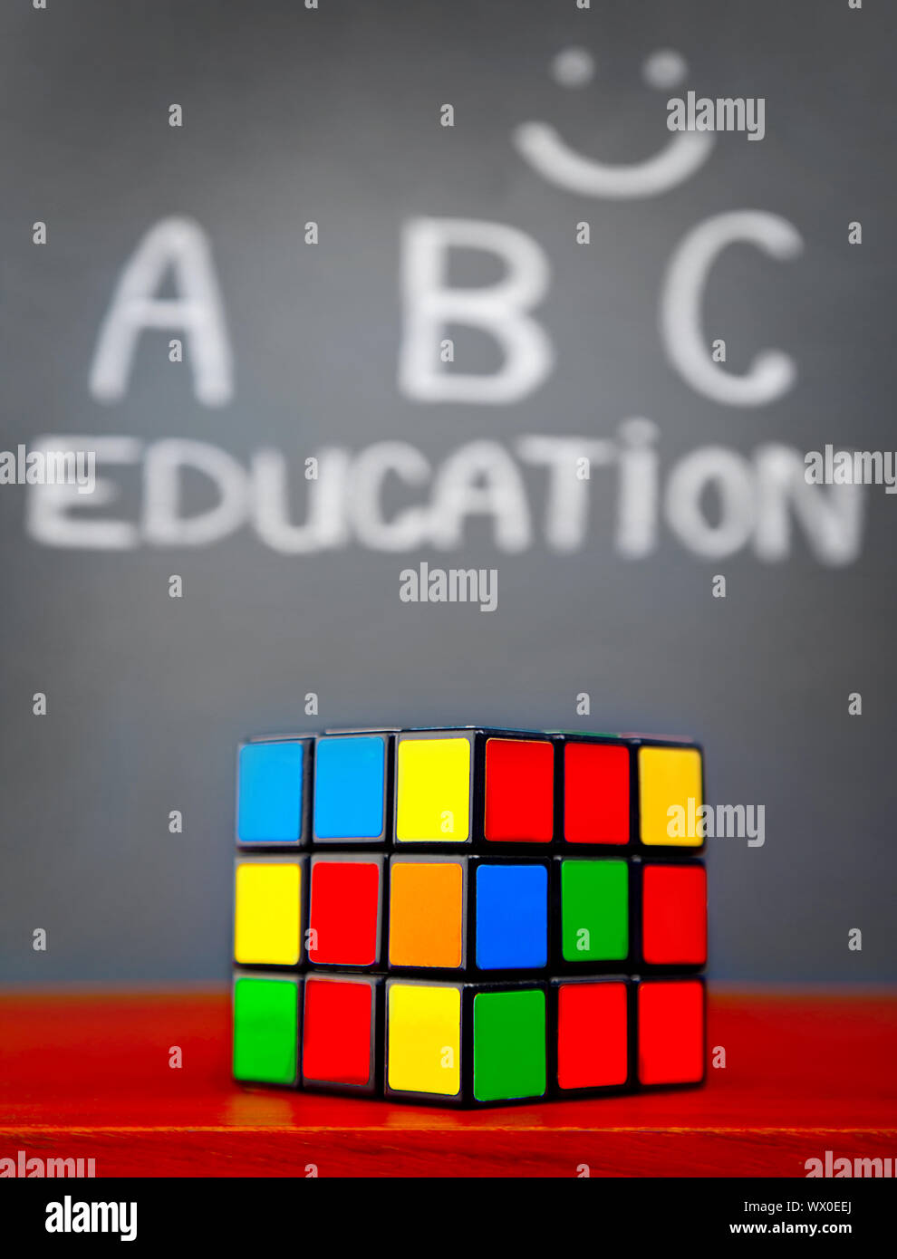 Back to school concept, handwriting on a grey chalkboard with a ...
