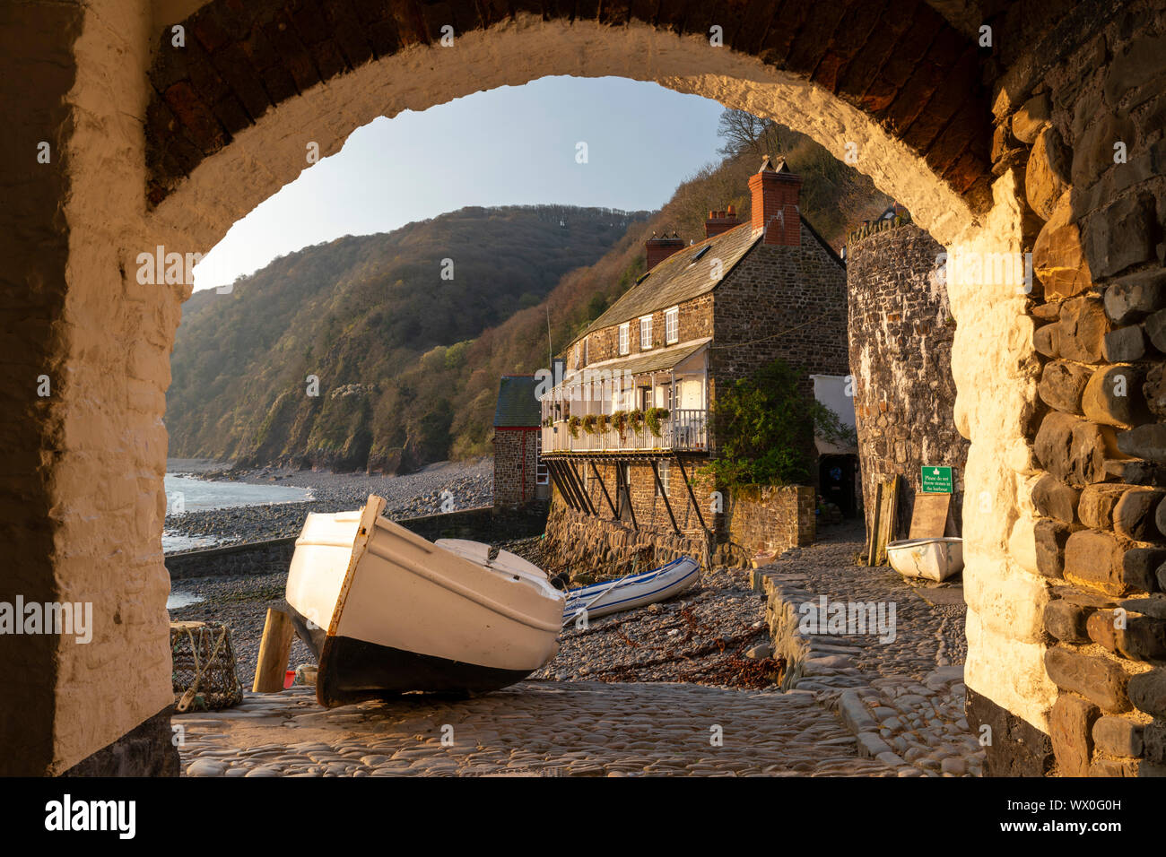 Clovelly harbour through archway, Clovelly, Devon, England, United Kingdom, Europe Stock Photo