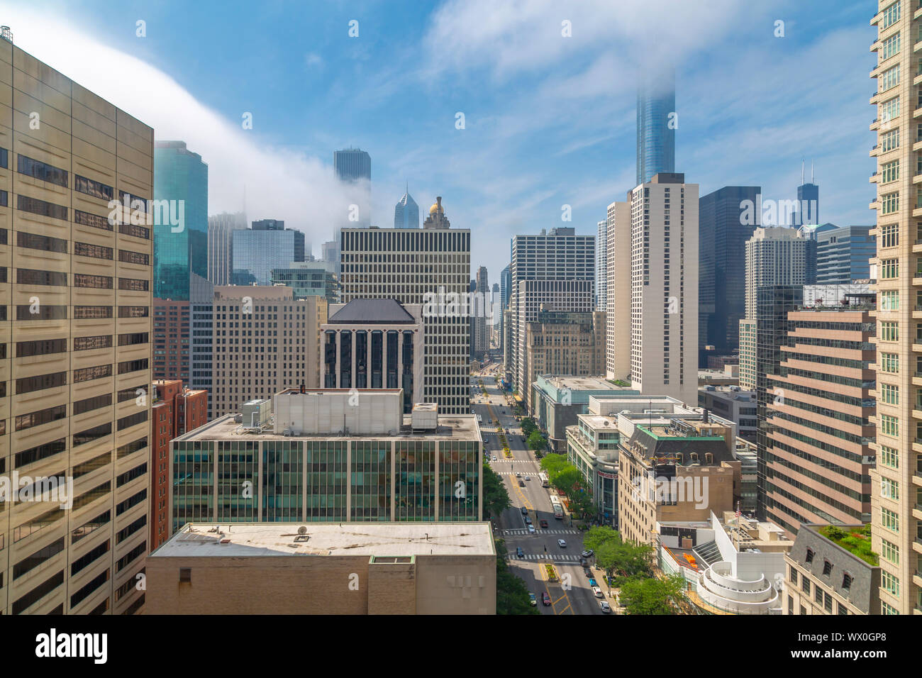 View of Chicago skyline from hotel window on Michigan Avenue at dusk