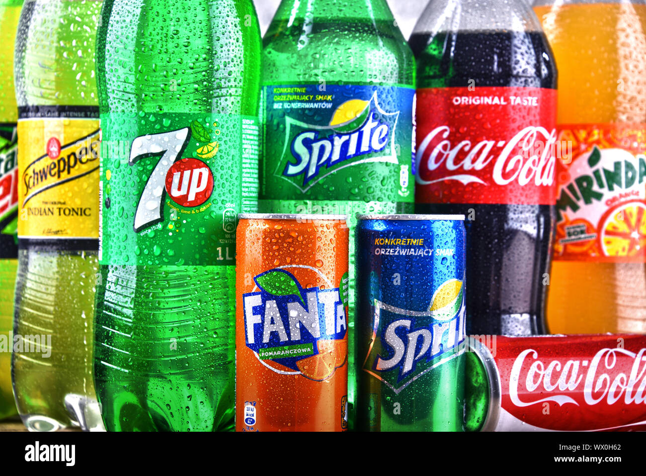 Bottles of global soft drink brands including products of Coca Cola Company and Pepsico Stock Photo