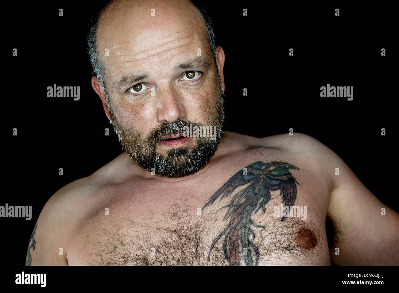 An image of a handsome man with a beard Stock Photo - Alamy