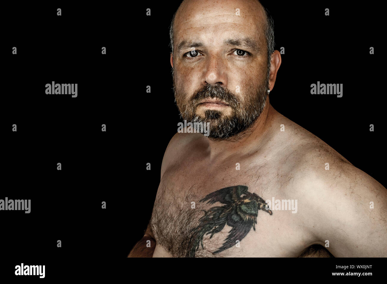 An image of a handsome man with a beard Stock Photo - Alamy