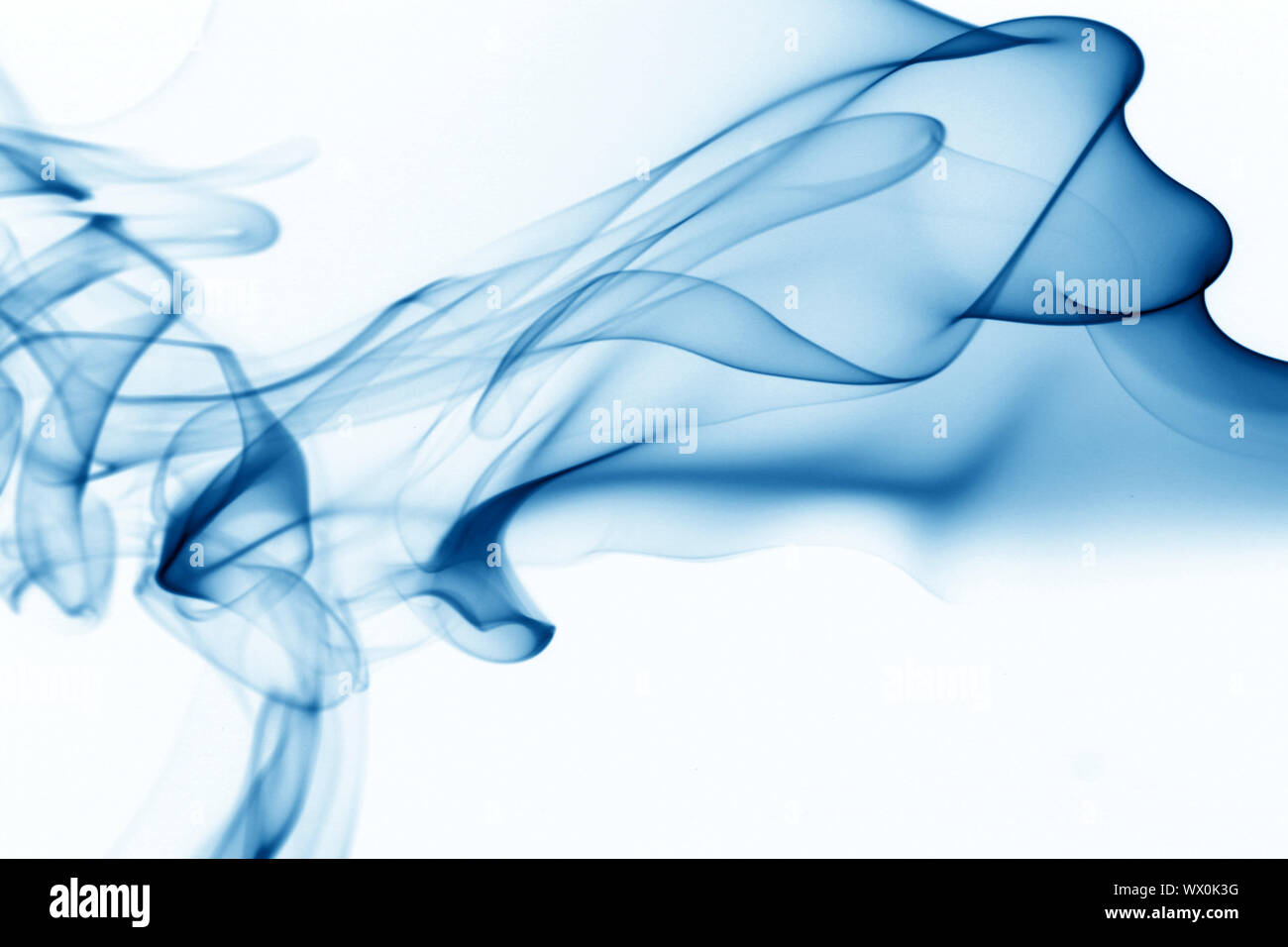 blue smoke on white background Stock Photo - Alamy